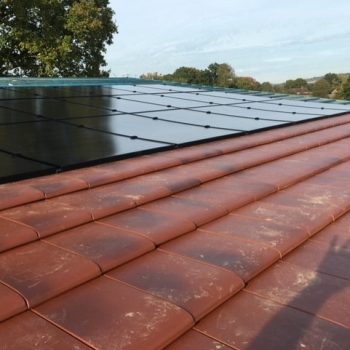 Solar Panels on a Red Tiled Roof