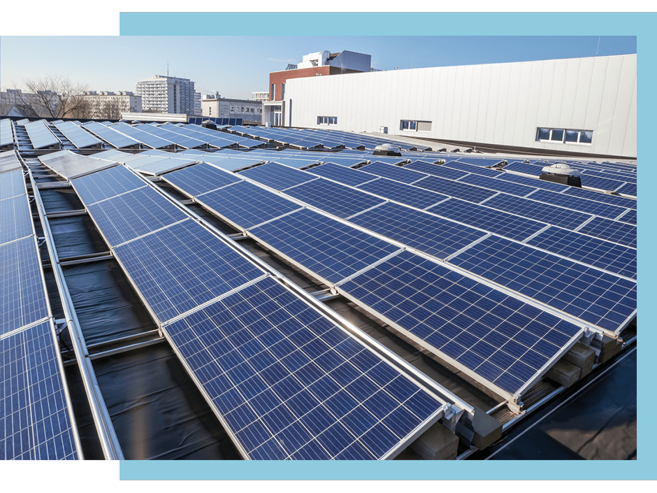 commercial-solar-pv-min solar panels on roof of commercial building